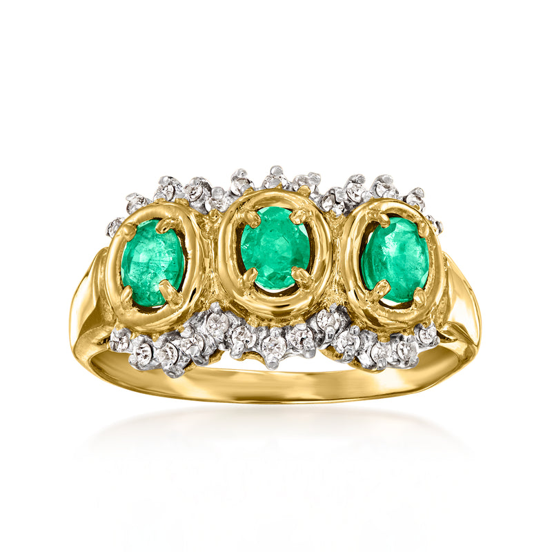 Vintage 14kt yellow gold ring with three oval emeralds and diamond accents