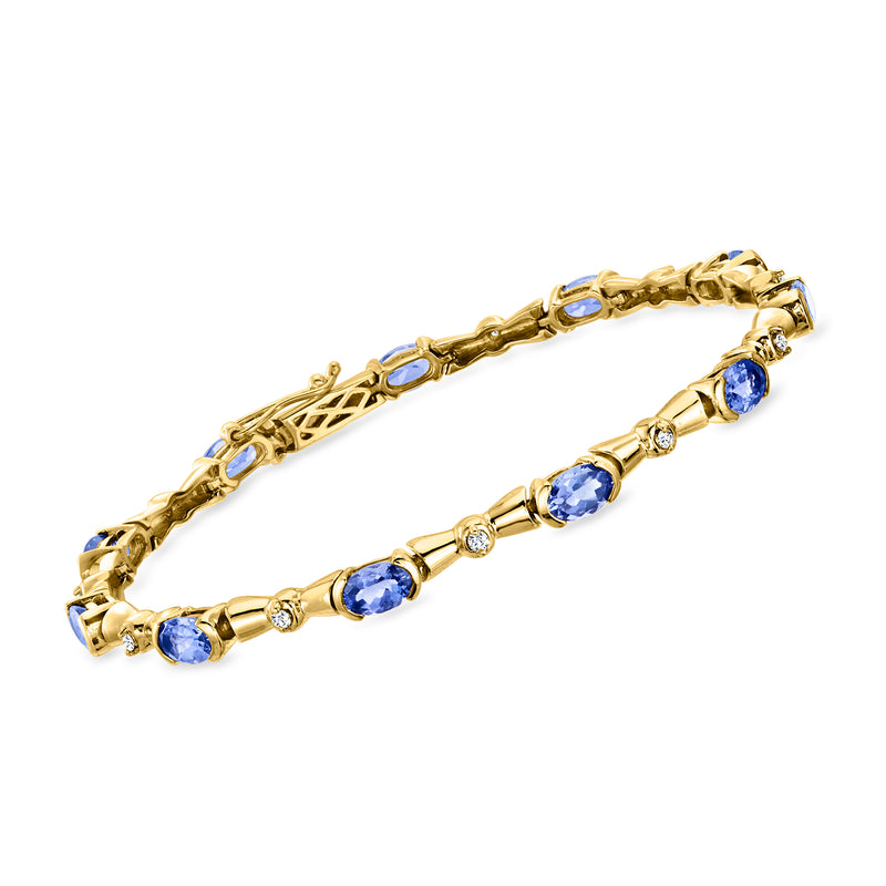 Vintage 14kt yellow gold tanzanite bracelet with blue oval stones and diamond accents
