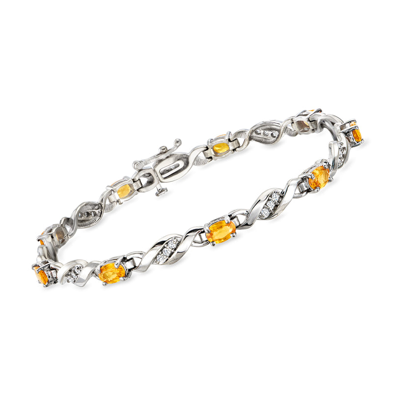 Vintage yellow sapphire and diamond bracelet in white gold with oval gemstone links
