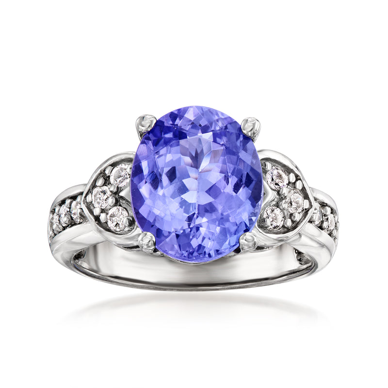 14kt white gold ring with oval tanzanite center and diamond side accents