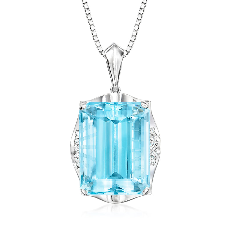 Platinum pendant necklace with large light blue topaz cushion and diamond accents