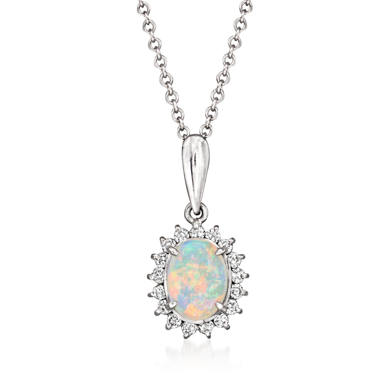 Platinum opal and diamond halo pendant necklace with oval opal center on chain