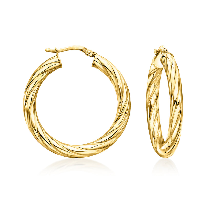 Twisted hoop earrings in yellow gold with hinged clasp closure