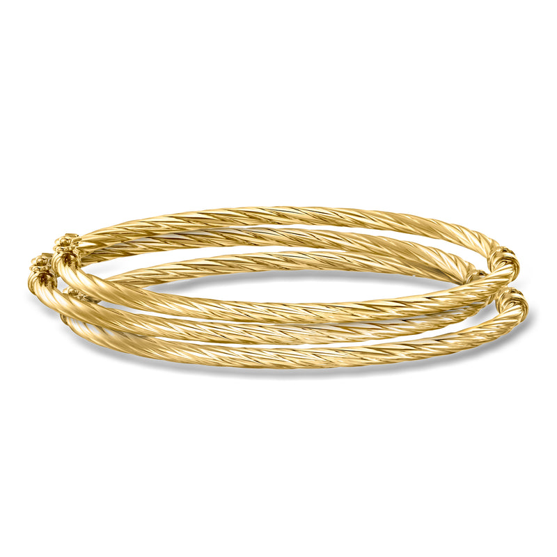 Three twisted 14kt yellow gold bangle bracelets