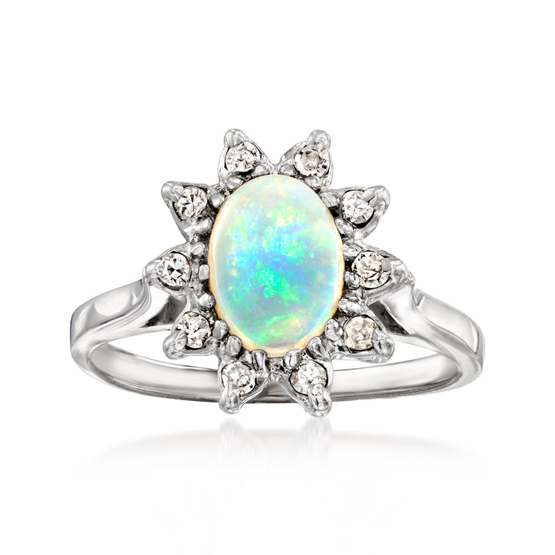 Oval opal and diamond halo ring in 14kt white gold, vintage style