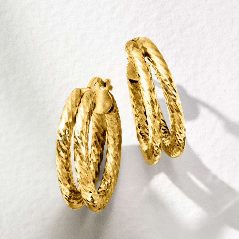 Gold over sterling two-row hoop earrings with textured rope-like twist detail