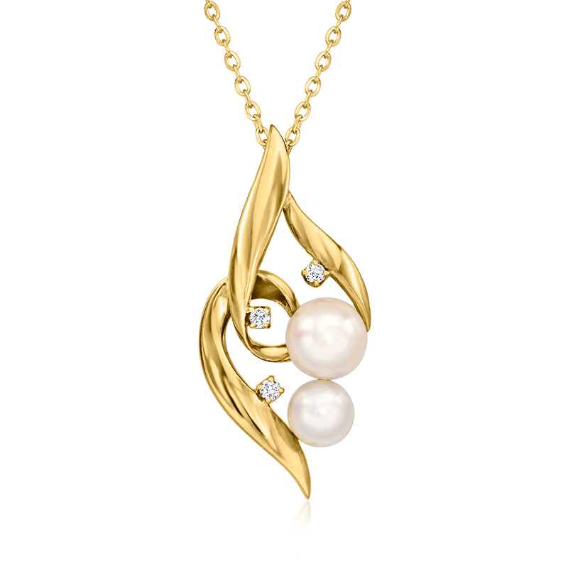 Vintage pearl pendant necklace in 18kt yellow gold, two white pearls and diamond accents