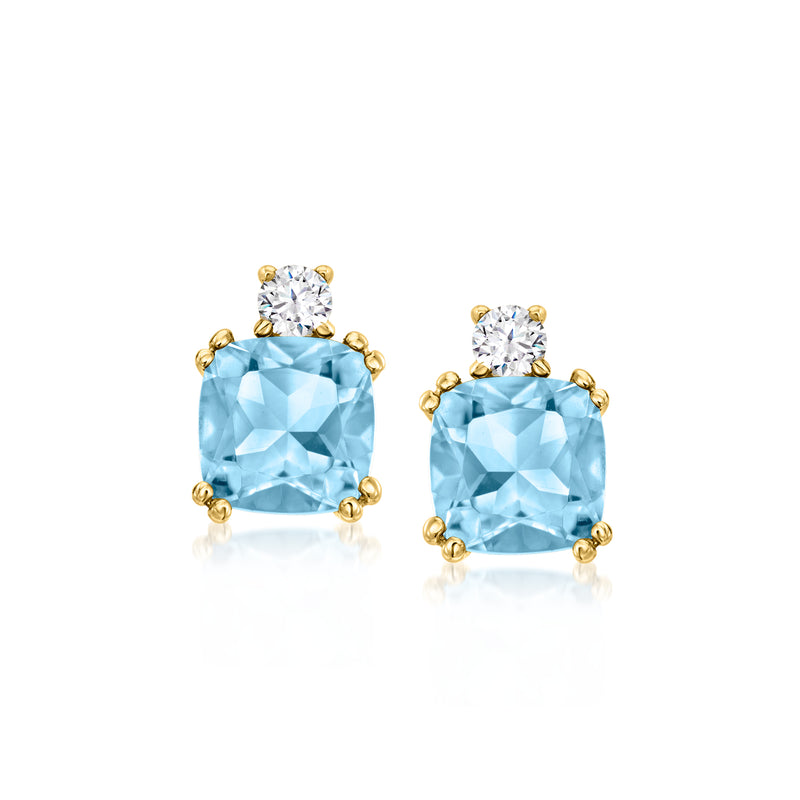 14kt yellow gold post earrings with sky blue topaz and small white topaz accents