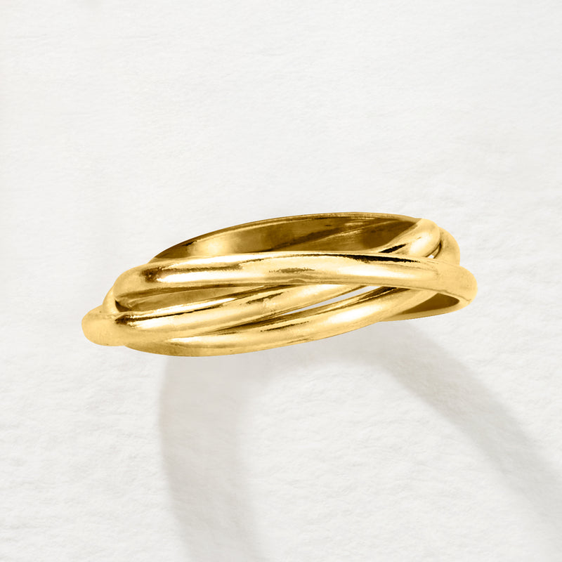 Gold over sterling rolling ring, low-profile ribbon band design with polished finish