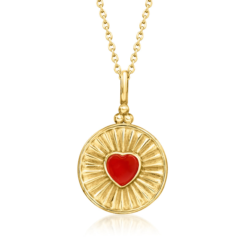 Gold heart pendant necklace with red heart center and sunburst frame