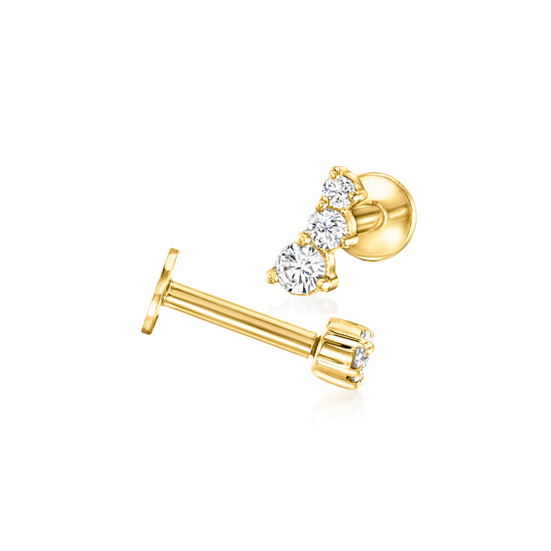 Yellow gold three-stone diamond flat-back studs shown from the side with post backs