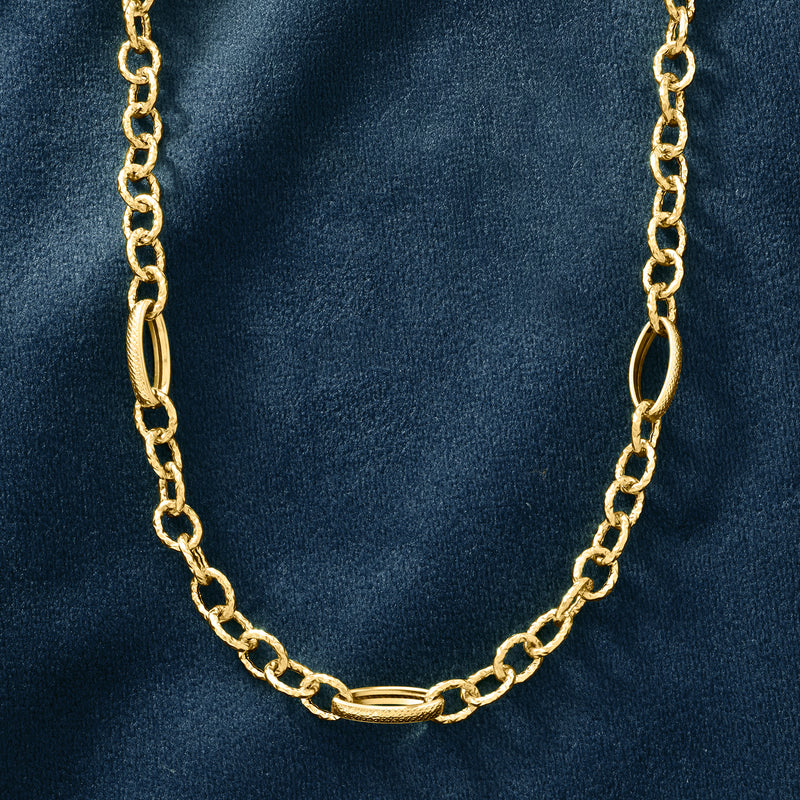 Yellow gold cable chain with oval-link connectors along the necklace