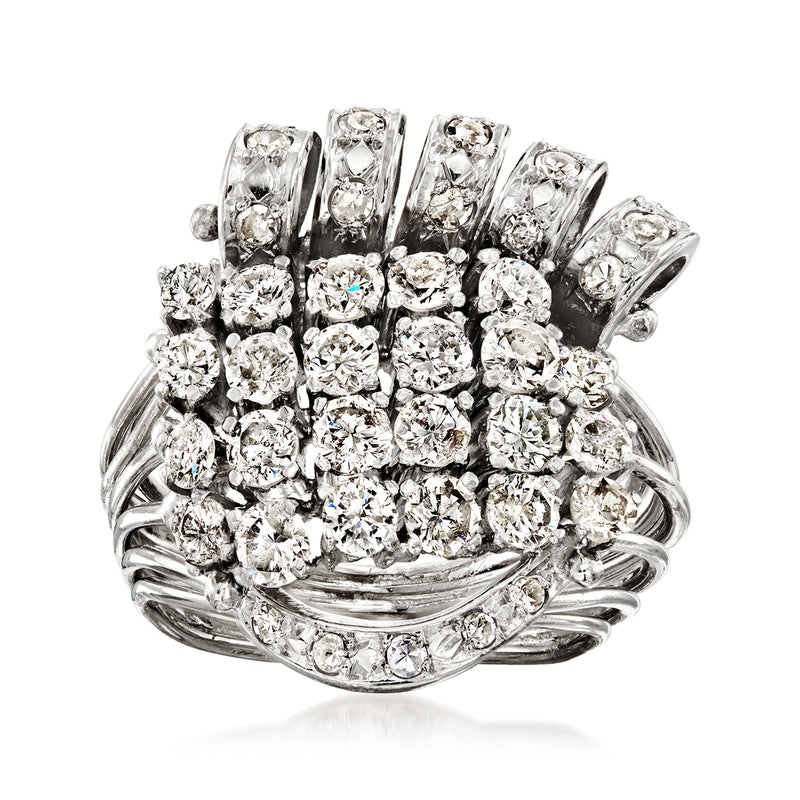 Platinum vintage diamond cluster ring with round diamonds in a squared halo