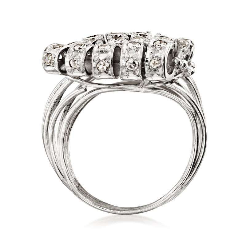 Platinum vintage diamond cluster ring top view with prong-set round diamonds