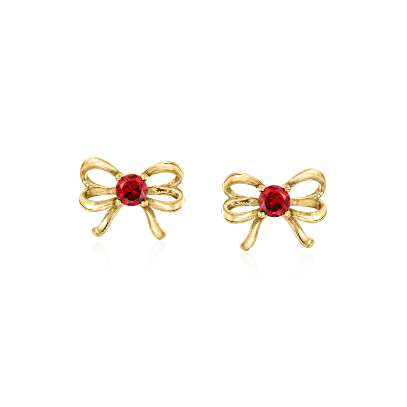 10kt yellow gold bow stud earrings with round red garnet center.
