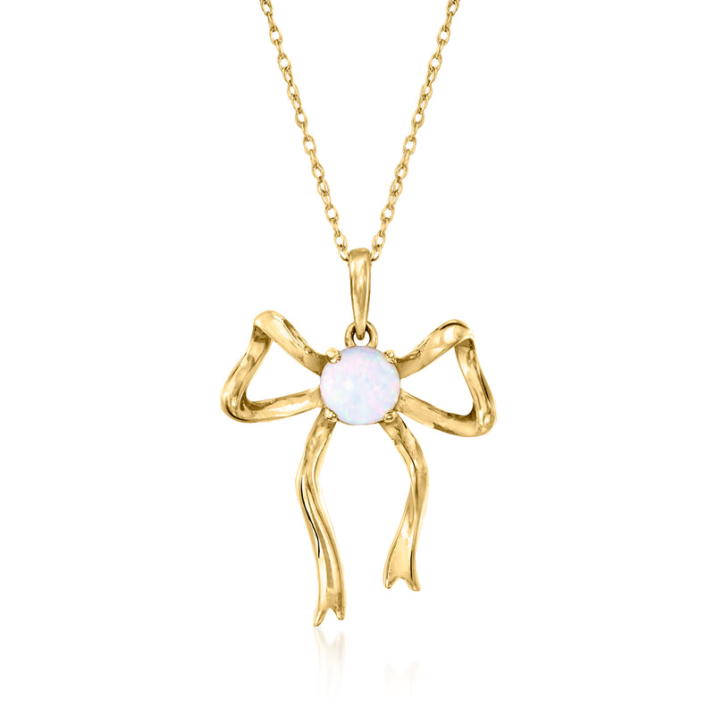 10kt yellow gold bow necklace with oval opal pendant