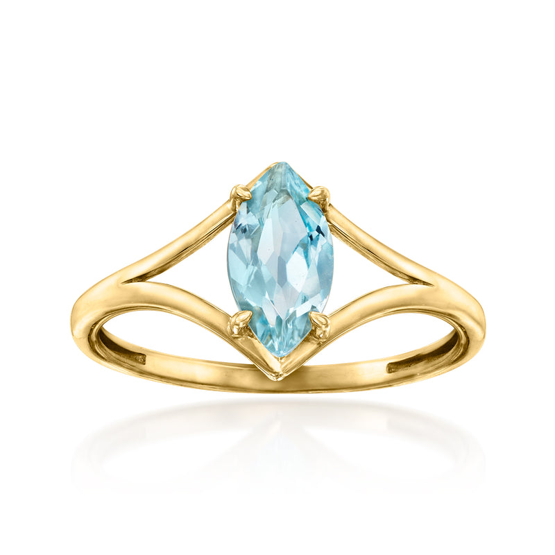 10kt yellow gold ring with marquise sky blue topaz center stone, four prongs