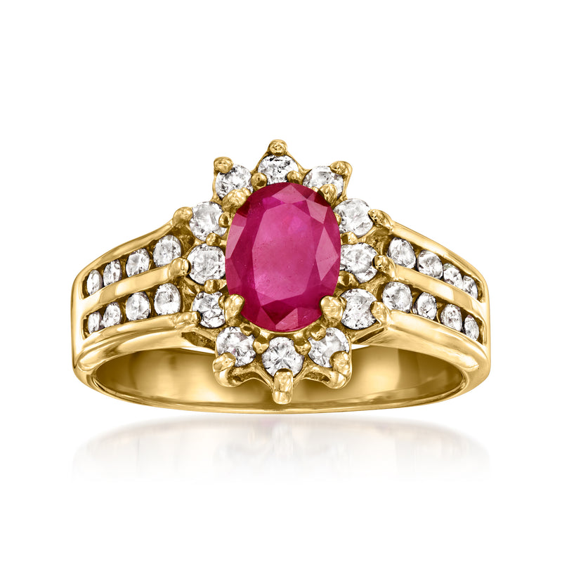Vintage 14k yellow gold ring with oval ruby center and diamond halo and side stones