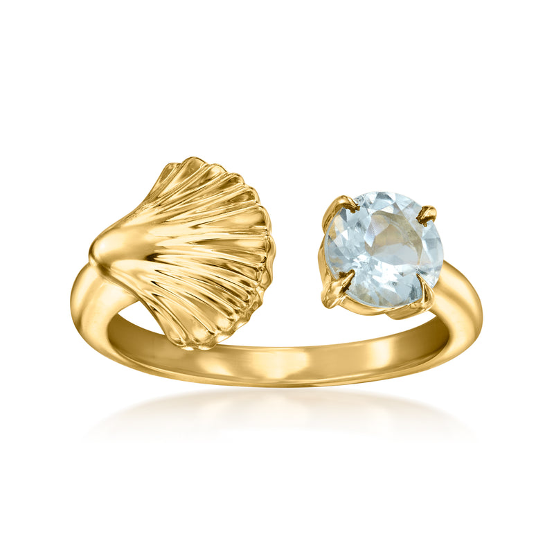 Seashell open-space ring in gold with oval aquamarine gemstone, ridged band