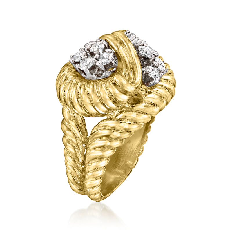 Yellow gold ribbed wrap ring with clustered diamonds at the top, angled side view