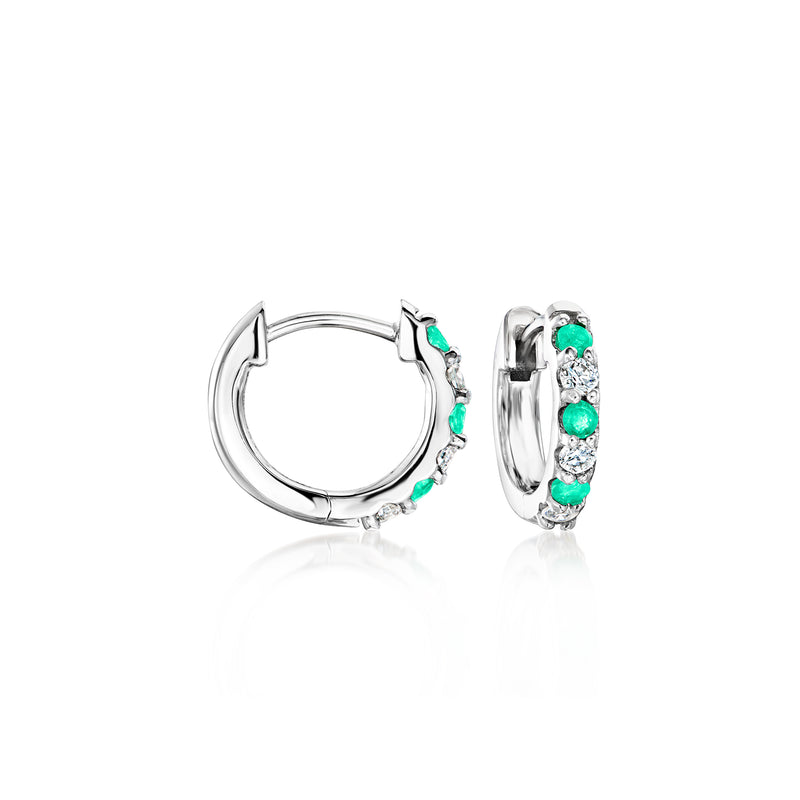 Sterling silver huggie hoop earrings with emerald-green stones and diamond accents