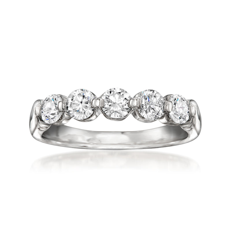 Platinum five-stone diamond ring with five round brilliant stones