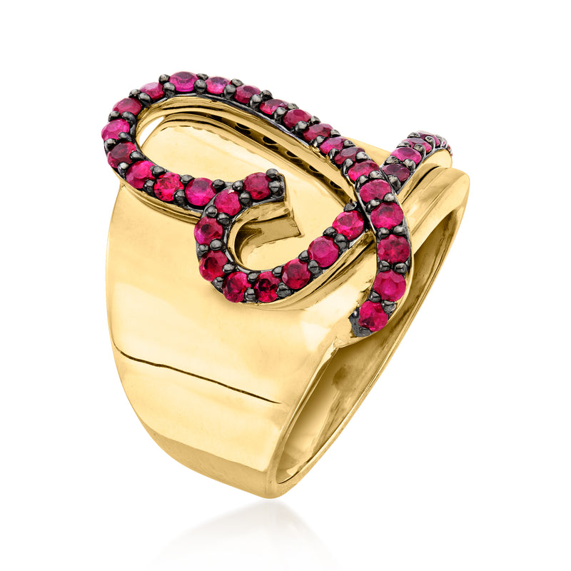 Gold tone ring with raised pink gemstone heart border, side view