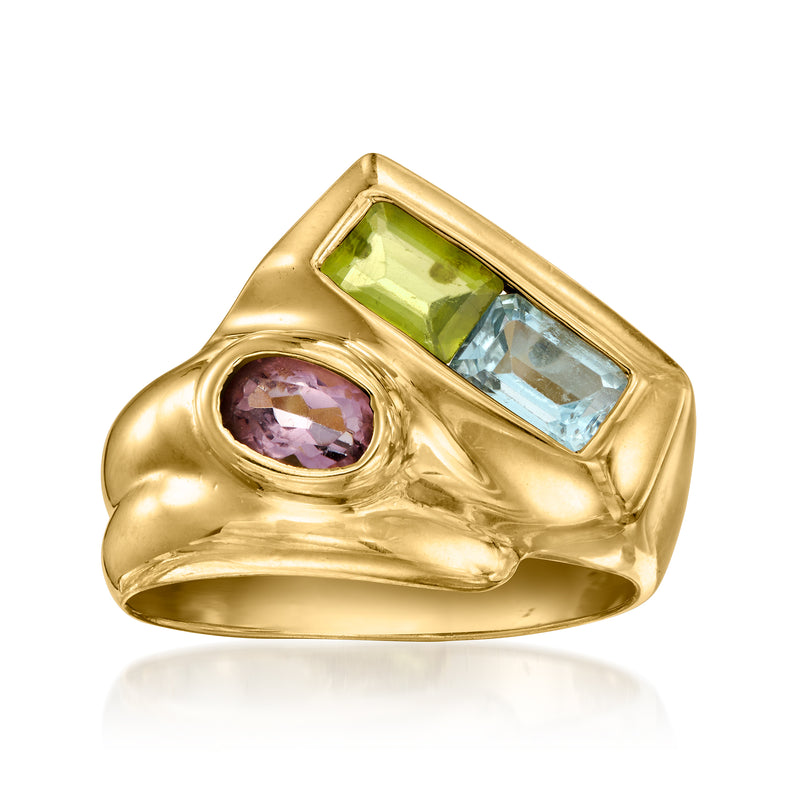 Vintage 14kt yellow gold ring with blue topaz, green peridot, and amethyst accents.