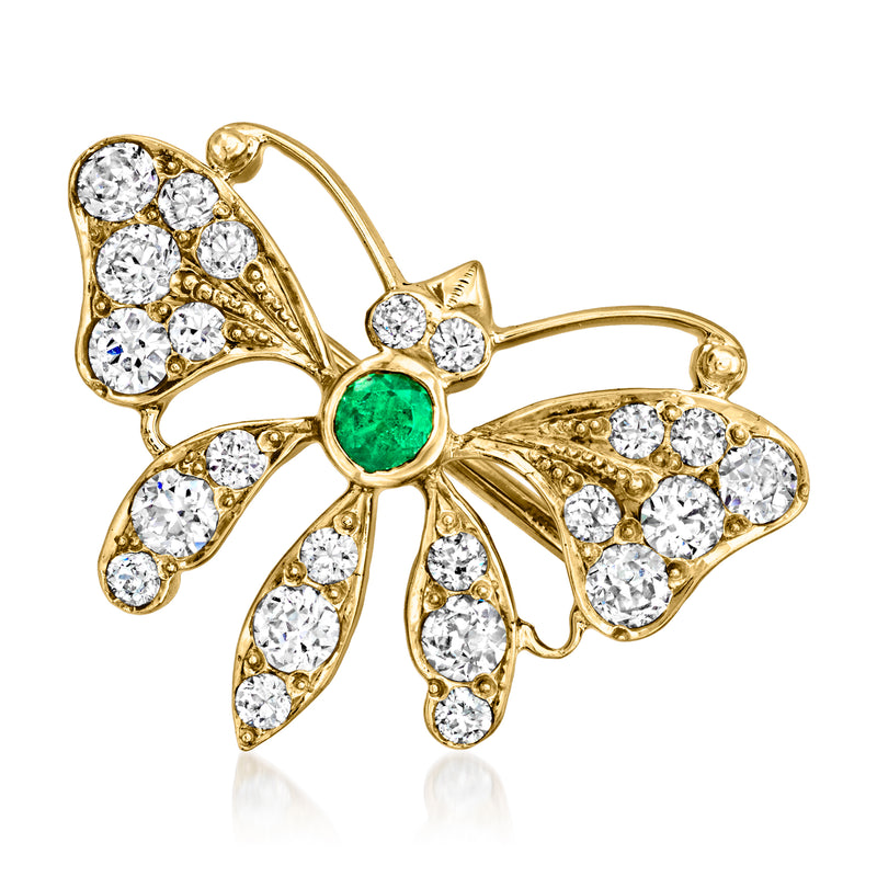 Vintage butterfly pin in 14kt yellow gold with green center and diamond accents