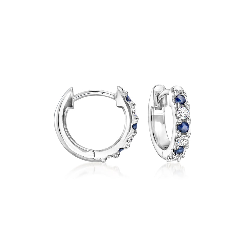 Sterling silver huggie hoop earrings with blue sapphires and clear diamond accents
