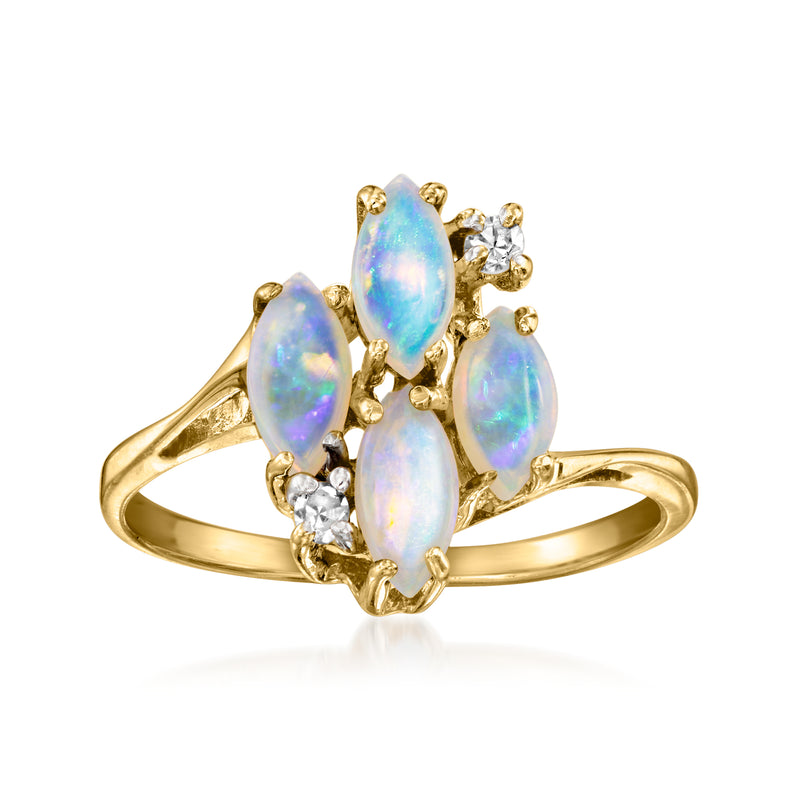 Vintage opal and diamond ring, three oval opals in 10kt yellow gold