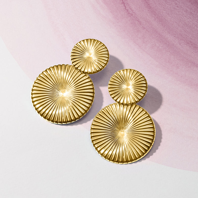 Gold-tone double-disc drop earrings with circular sunburst discs