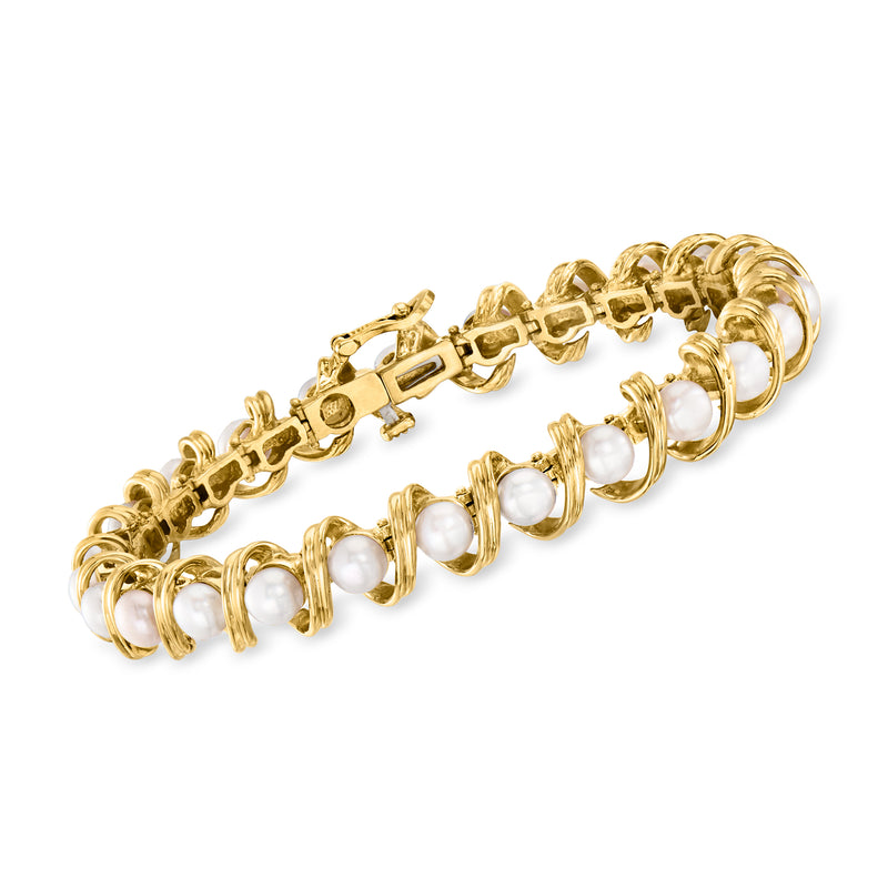 Vintage 14kt yellow gold bracelet with cultured pearl swirl links and clasp