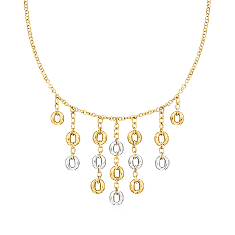 Two-tone gold drop necklace with small multi-circle charms on a fine chain