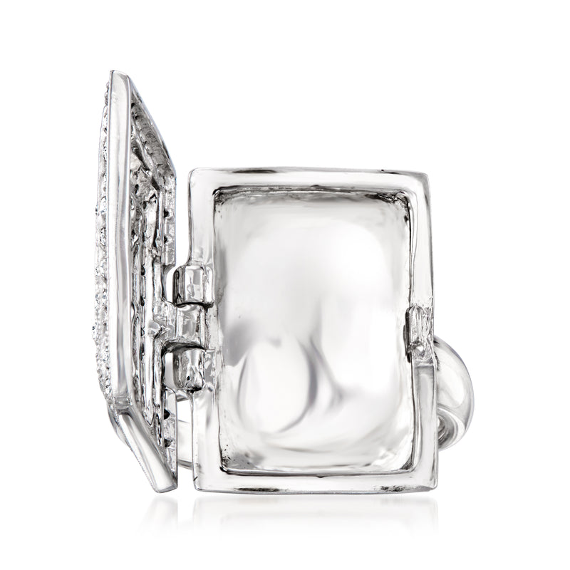 White gold diamond ring with square center, open back, and side prong details