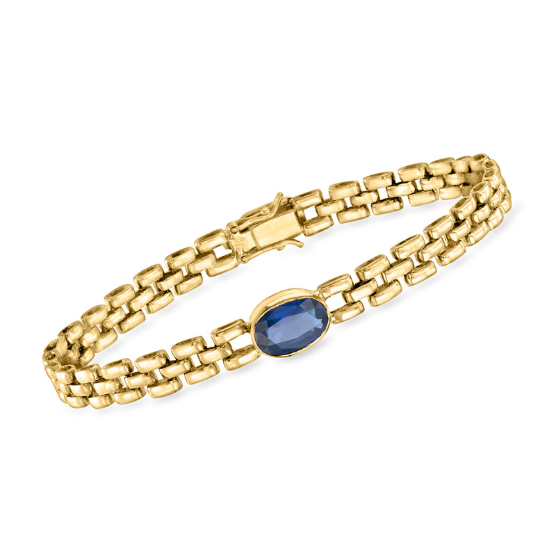 Vintage gold link bracelet with oval blue sapphire stone