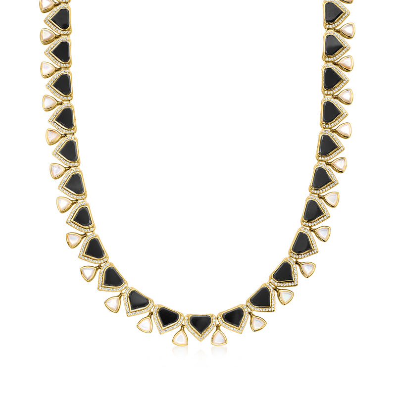 Gold-tone necklace with black onyx-like stones and white mother-of-pearl heart details