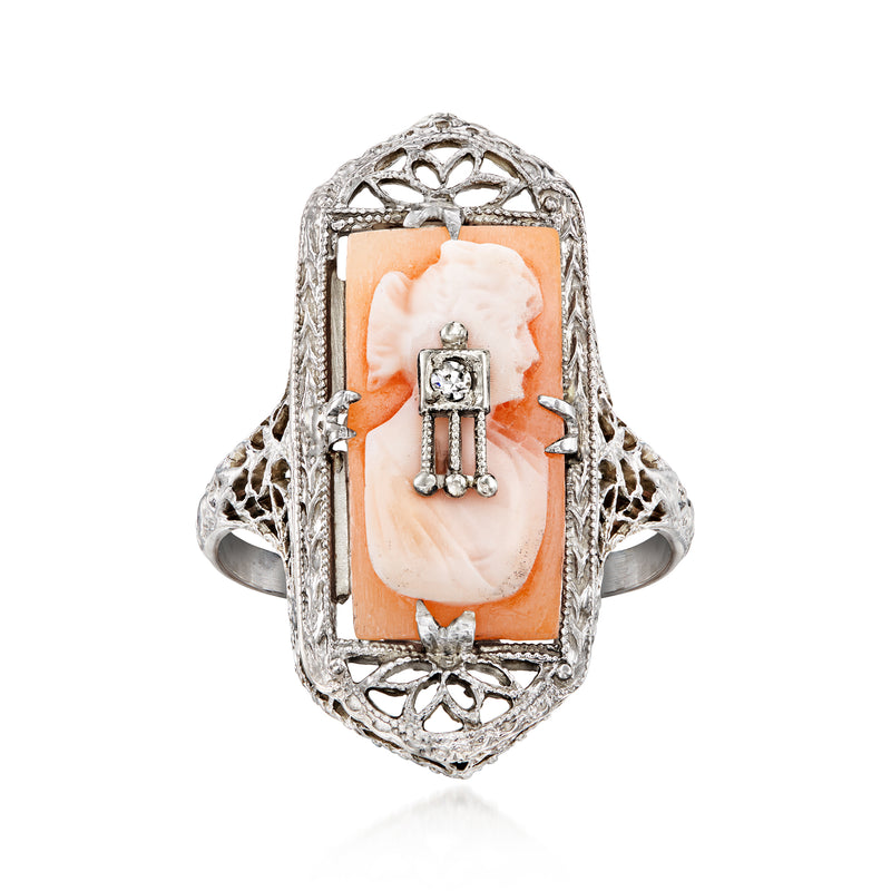 Vintage orange shell cameo ring in 14kt white gold with single diamond and filigree setting
