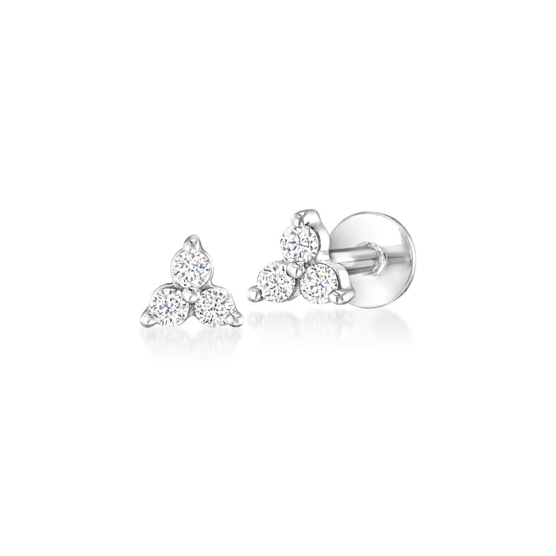 Two three-stone diamond stud earrings with round lab-grown stones, flat-back design