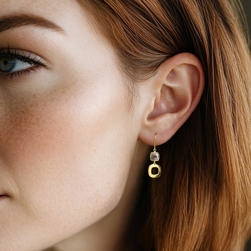 Geometric drop earrings in 10kt yellow gold with blue stone and oval charm