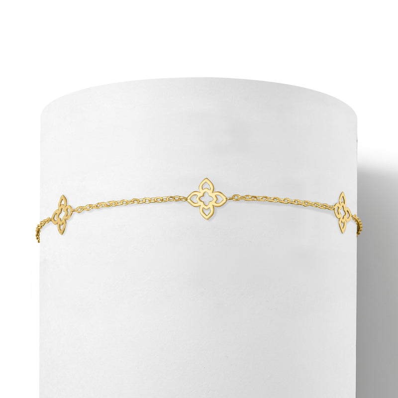 10k yellow gold bracelet with central clover-flower motif and linked chain
