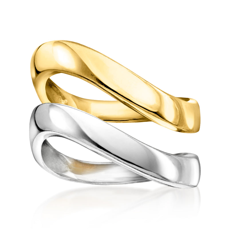 Two wavy gold and silver stack rings, polished metal bands with curved profile