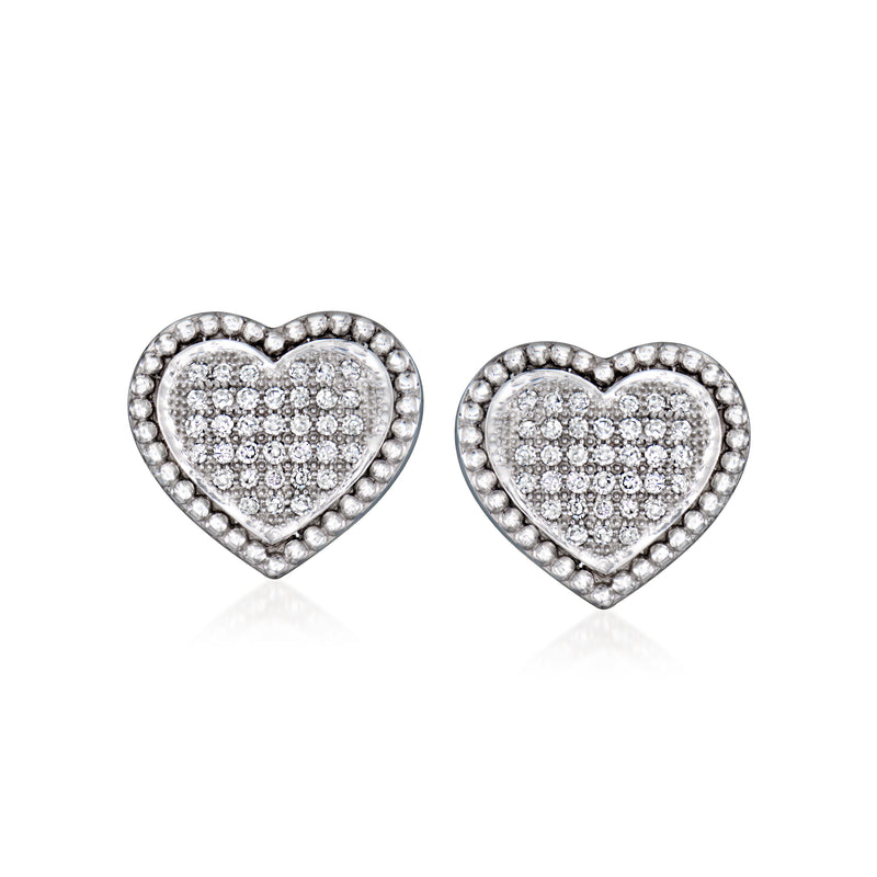 Diamond heart post earrings in white gold, pavé set
