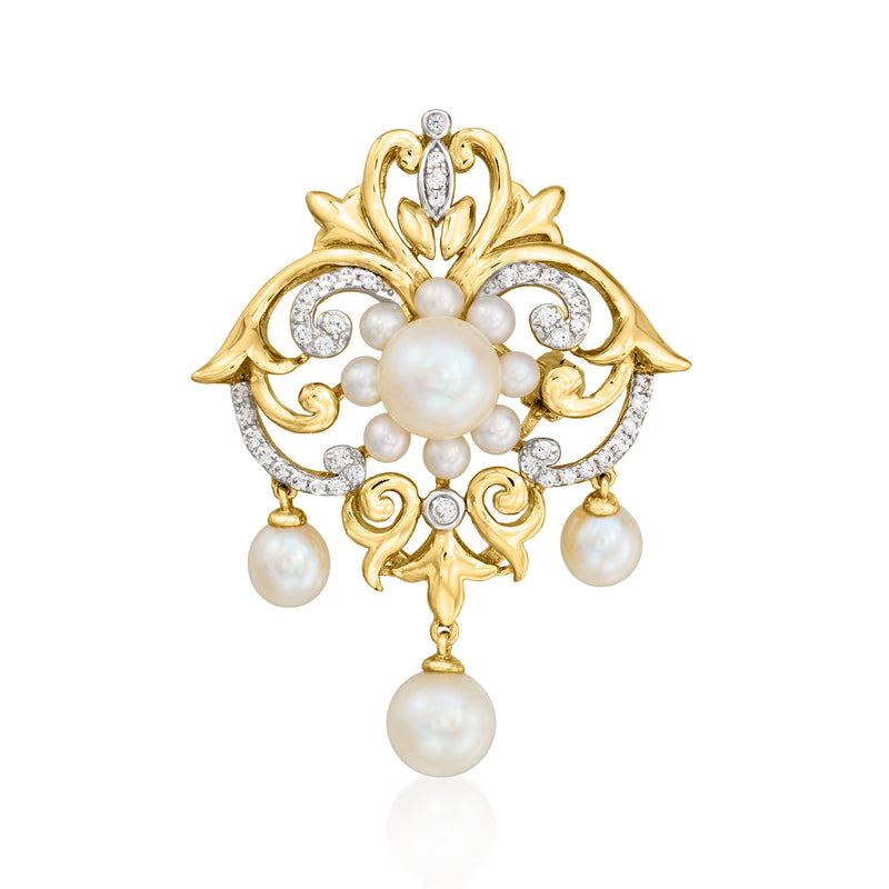 Gold pearl and CZ pendant with central round pearl, gold filigree, and dangling drops