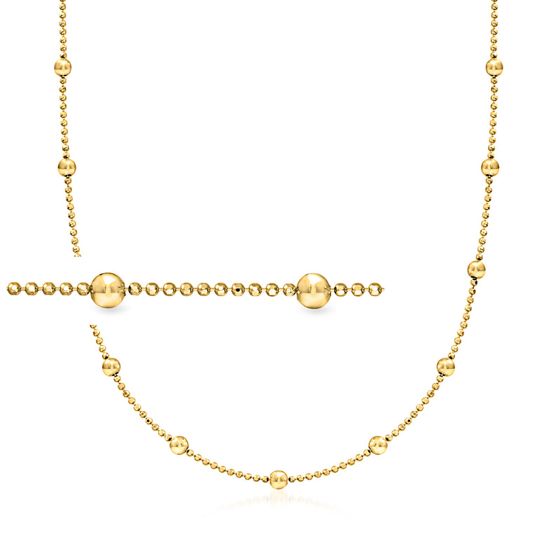 Gold-tone bead station necklace with round beads and two larger ball stations