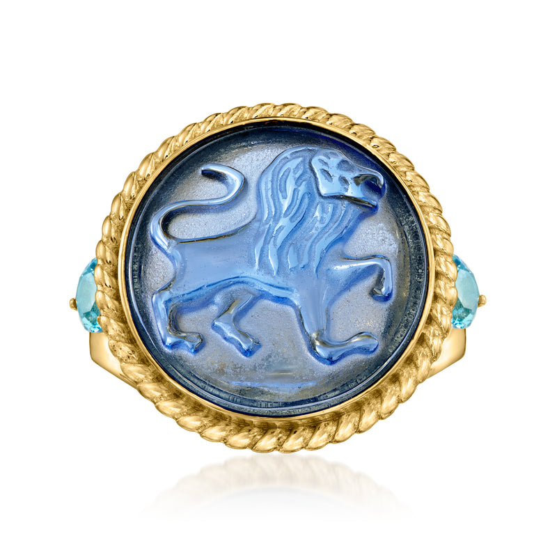 Gold ring with oval blue lion cameo, beaded edge, light blue side stones