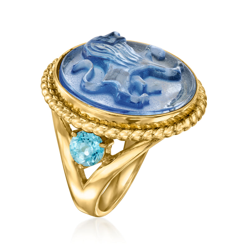 Gold ring angled view, oval blue lion cameo with beaded halo and light blue stone