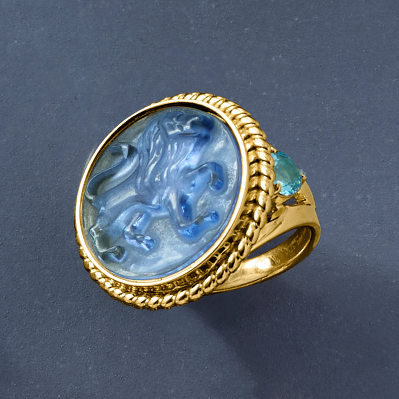 Gold oval cameo ring with blue lion scene, beaded setting and teal side gem