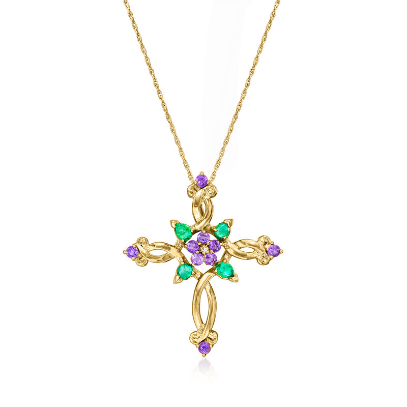 Vintage cross pendant necklace in yellow gold with purple and green gemstones and a small diamond