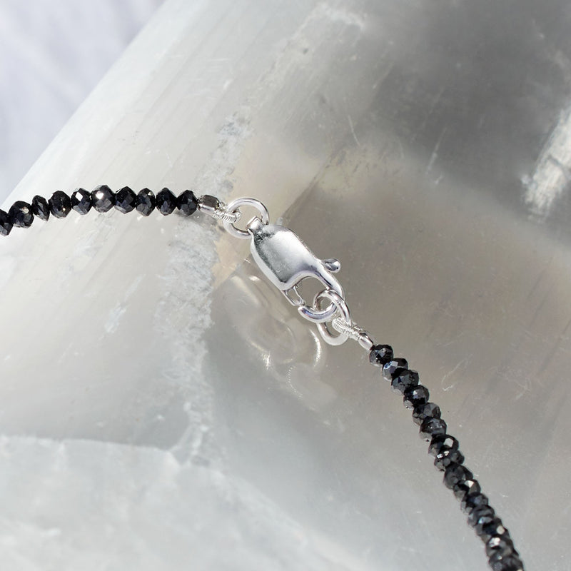 Black diamond bead necklace clasp detail with 14kt white gold lobster clasp